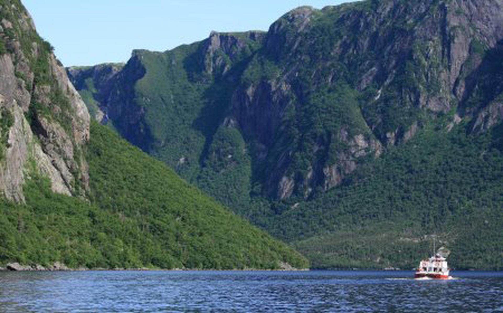 A tour boat on Western Brook Pond in Gros Morne National Park, Newfoundland, Canada.