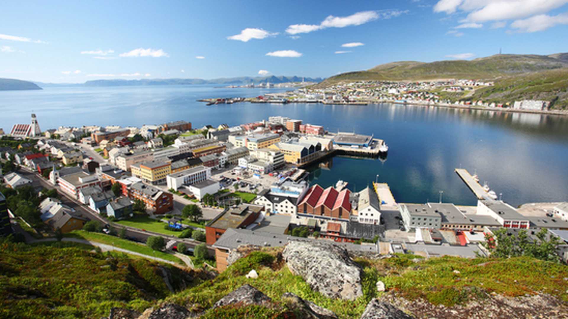 Panoramic shot of the waterside town of Hammerfest, Norway, on a sunny day
