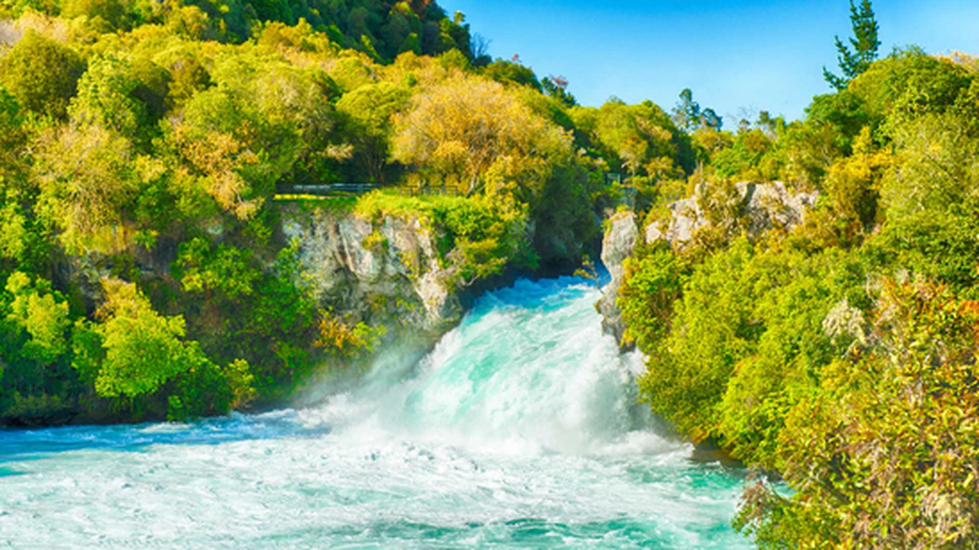 Water rushes through a narrow canyon at Huka Falls in Taupo, on New Zealand's North Island