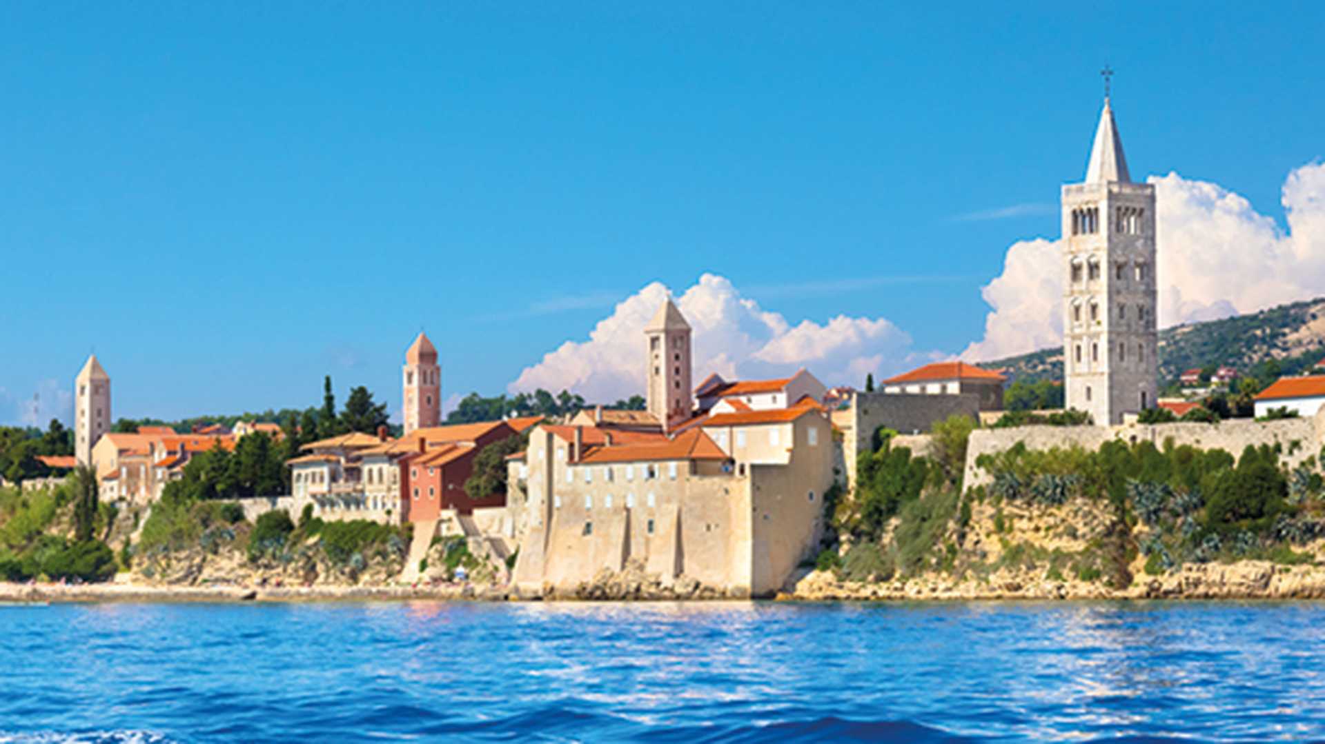 Four bell towers of the coastal town of Rab, Croatia