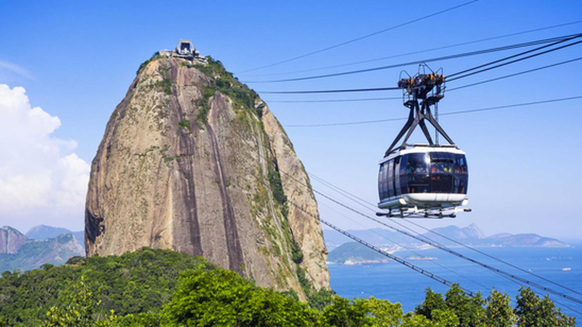 A cable car travels up to the peak of Sugarloaf Mountain, Brazil