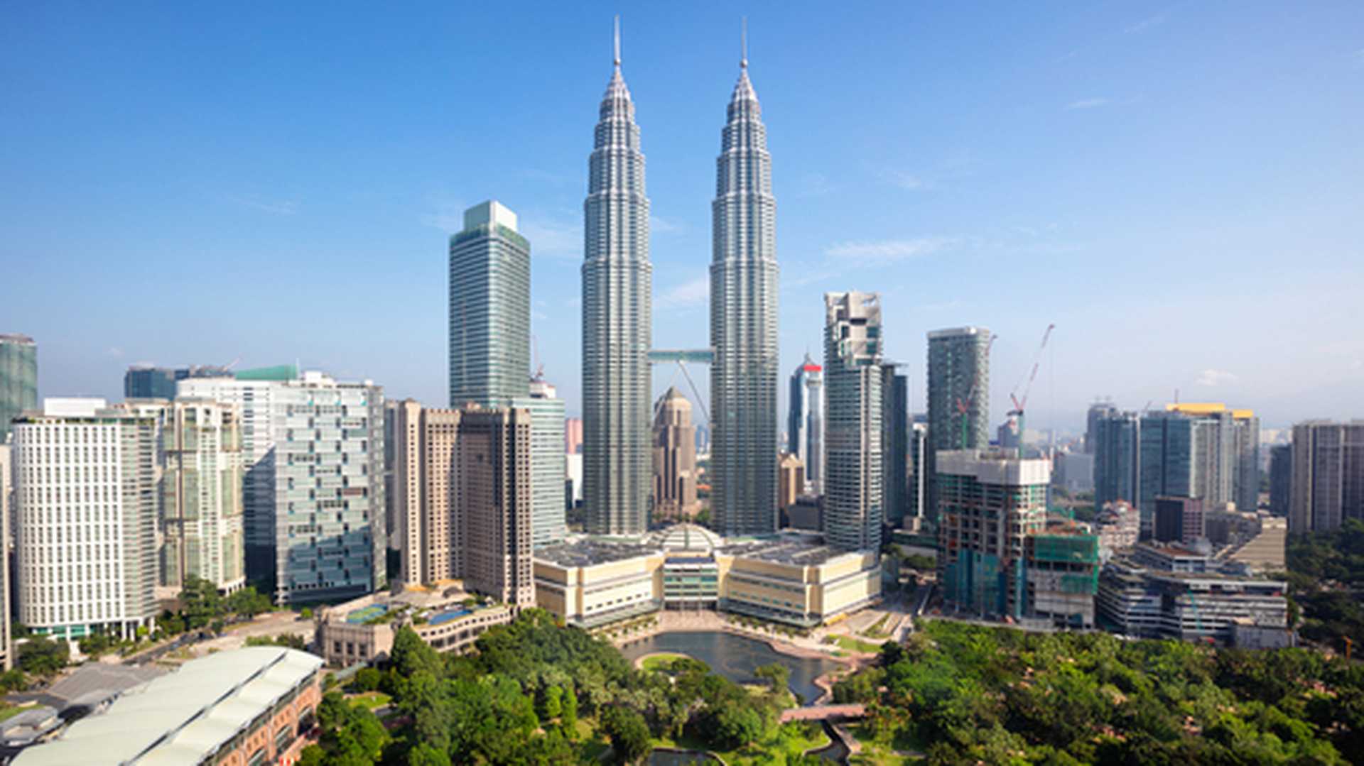 Aerial view across Kuala Lumpur and the Petronas Towers, Malaysia