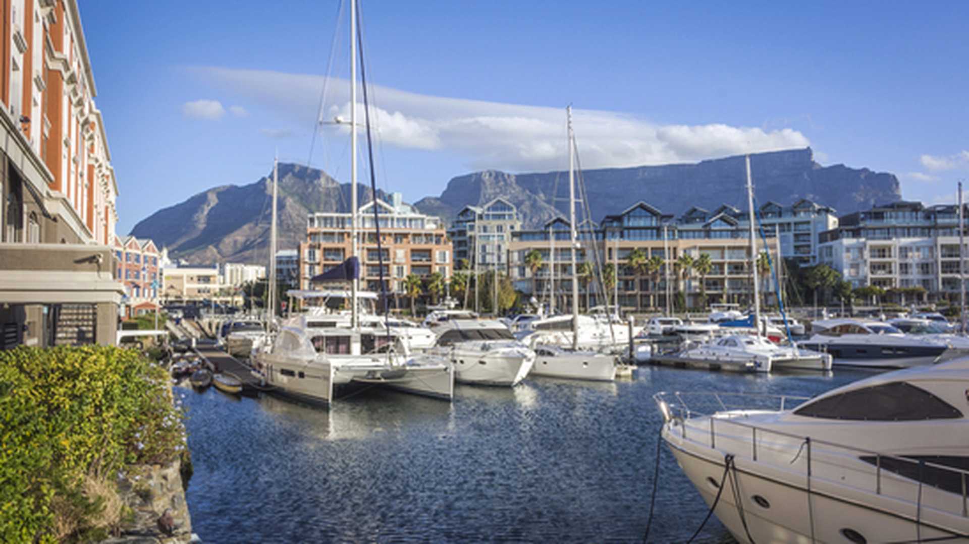 Famous V&A waterfront of Cape Town, SOUTH AFRICA, with table mountain background on the sunny day