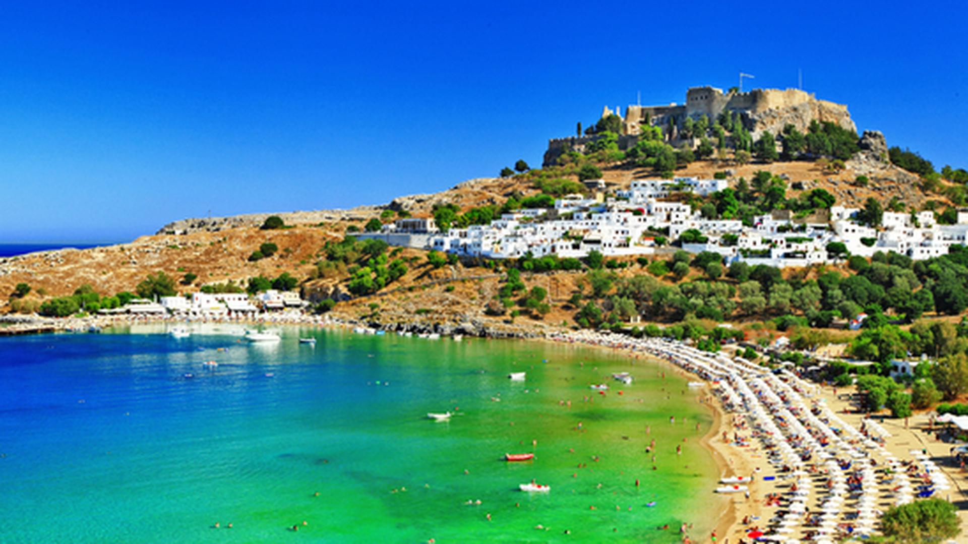 Panoramic view of Lindos Bay and beach, overlooked by the Acropolis