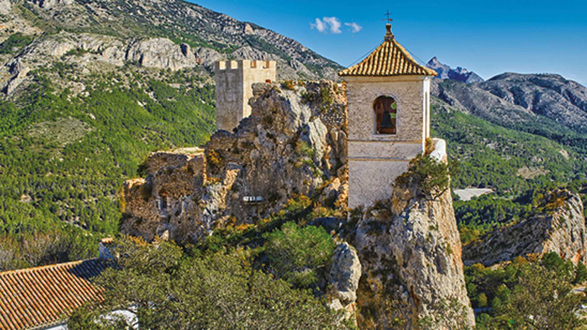 Guadalest castle perched on hill side, Alicante, Spain