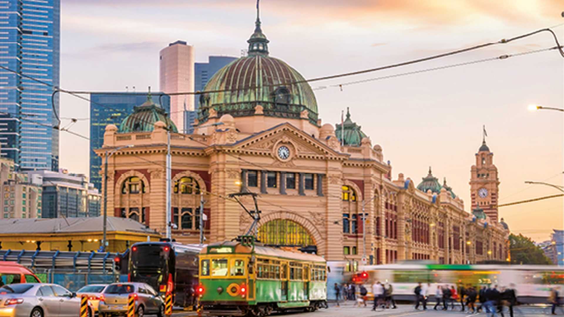 Melbourne Flinders Street Train Station in Australia at sunset