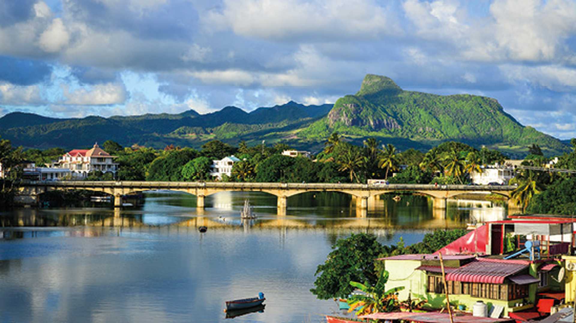 Bridge over a river with mountains in Mahebourg, Mauritius