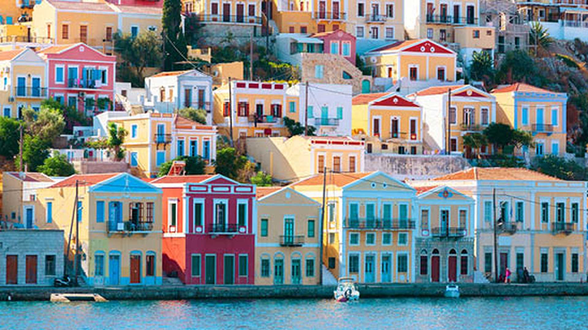 View of traditional colorful houses on Symi island, Greece