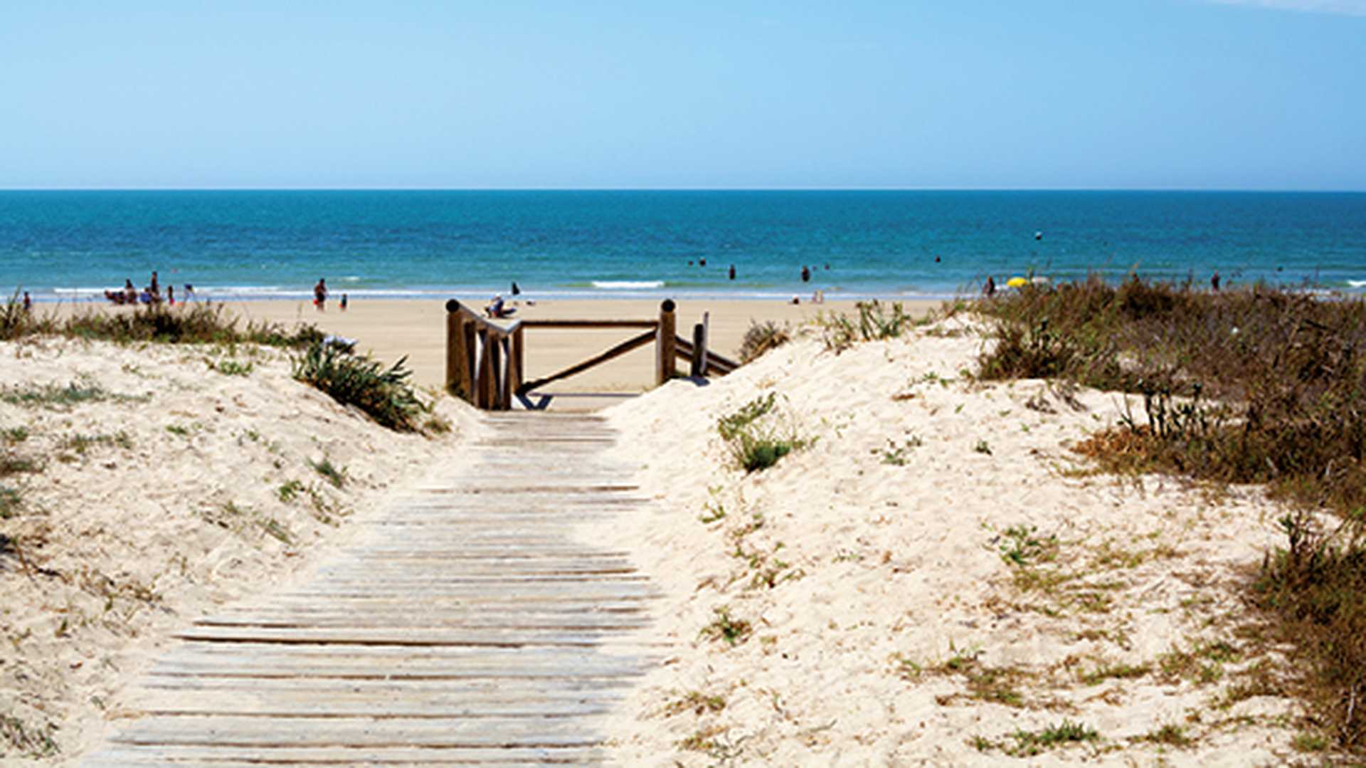 Golden sandy beaches near Sanlucar de Barrameda, small Andalusian town, Spain