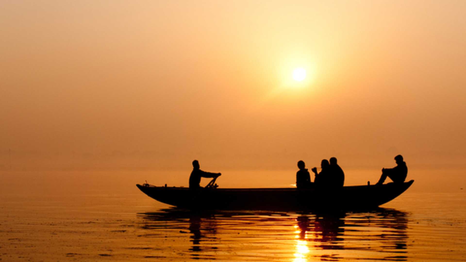 Golden sunrise on the river Ganges in Varanasi