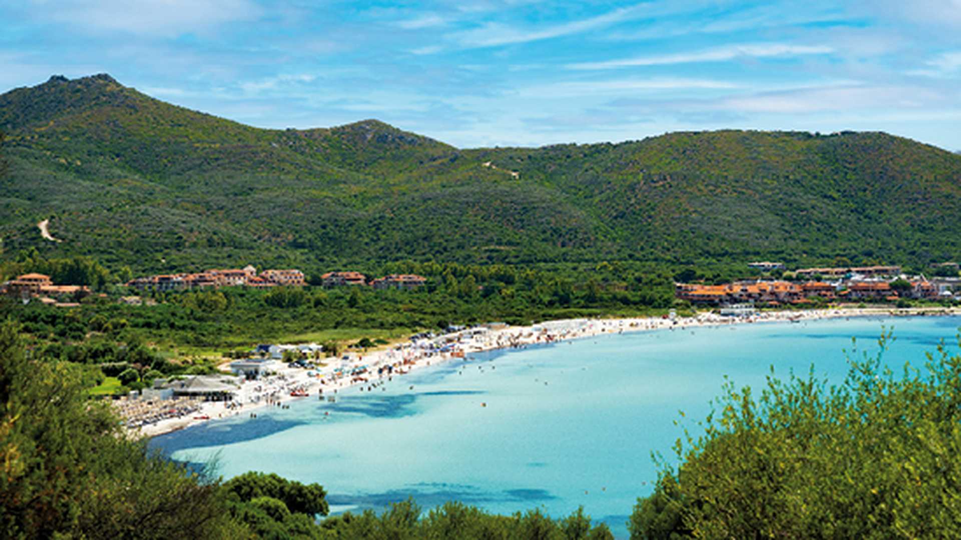 Stunning view of a white sand beach bathed by a beautiful turquoise sea. Marinella Beach, Porto Rotondo, Costa Smeralda, Sardinia, Italy. 