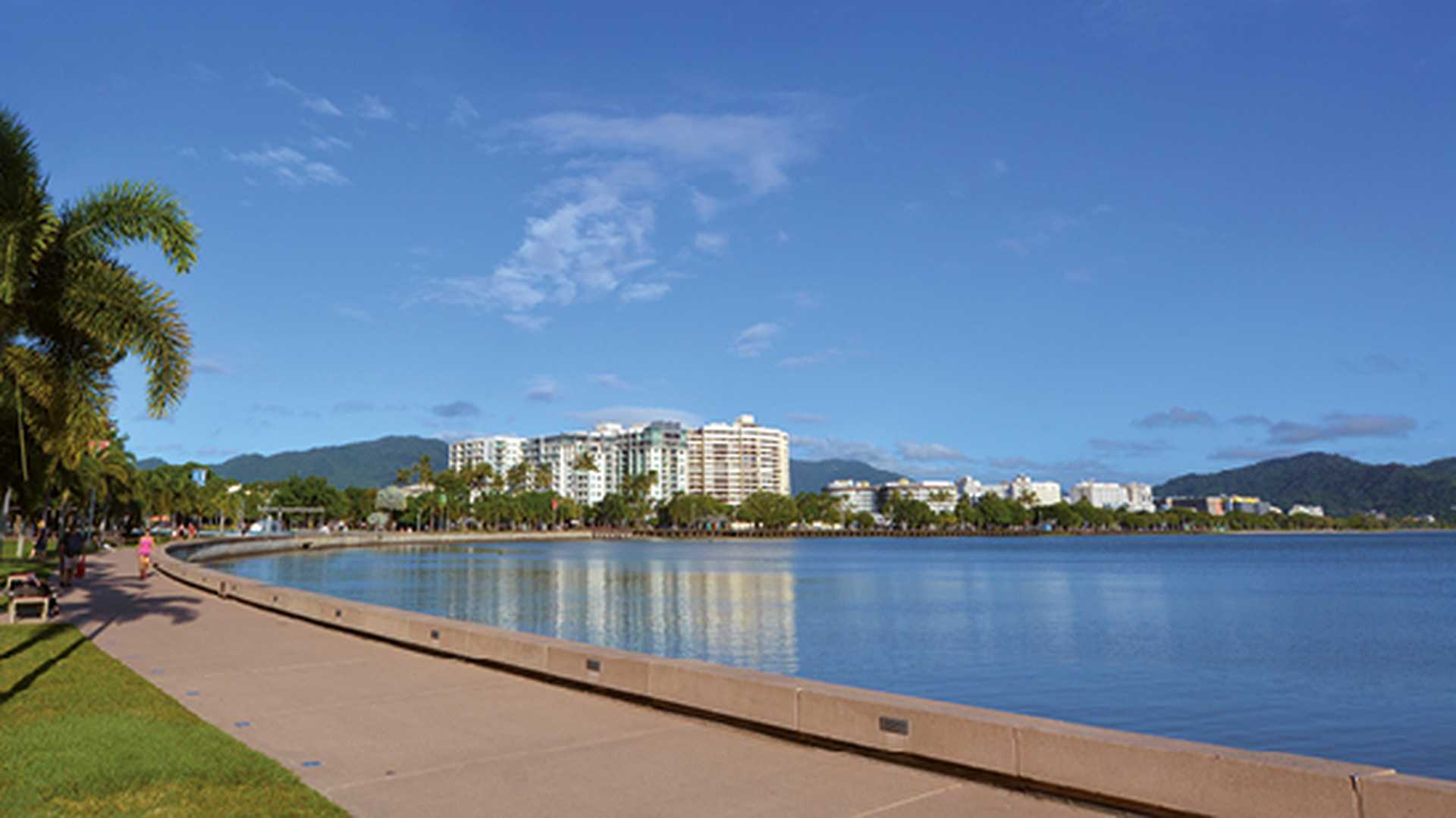 Cairns waterfront skyline at high tide of Coral sea. Queensland, Australia