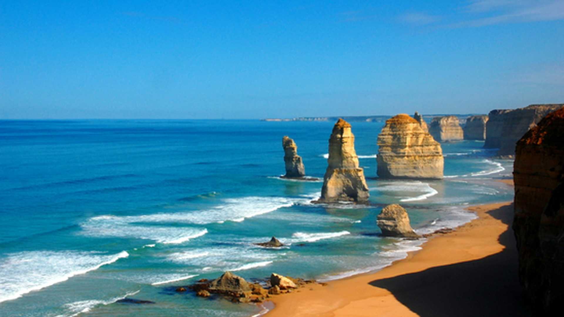 View of the beach and Twelve Apostles rock formations, found along the Great Ocean Road in Australia
