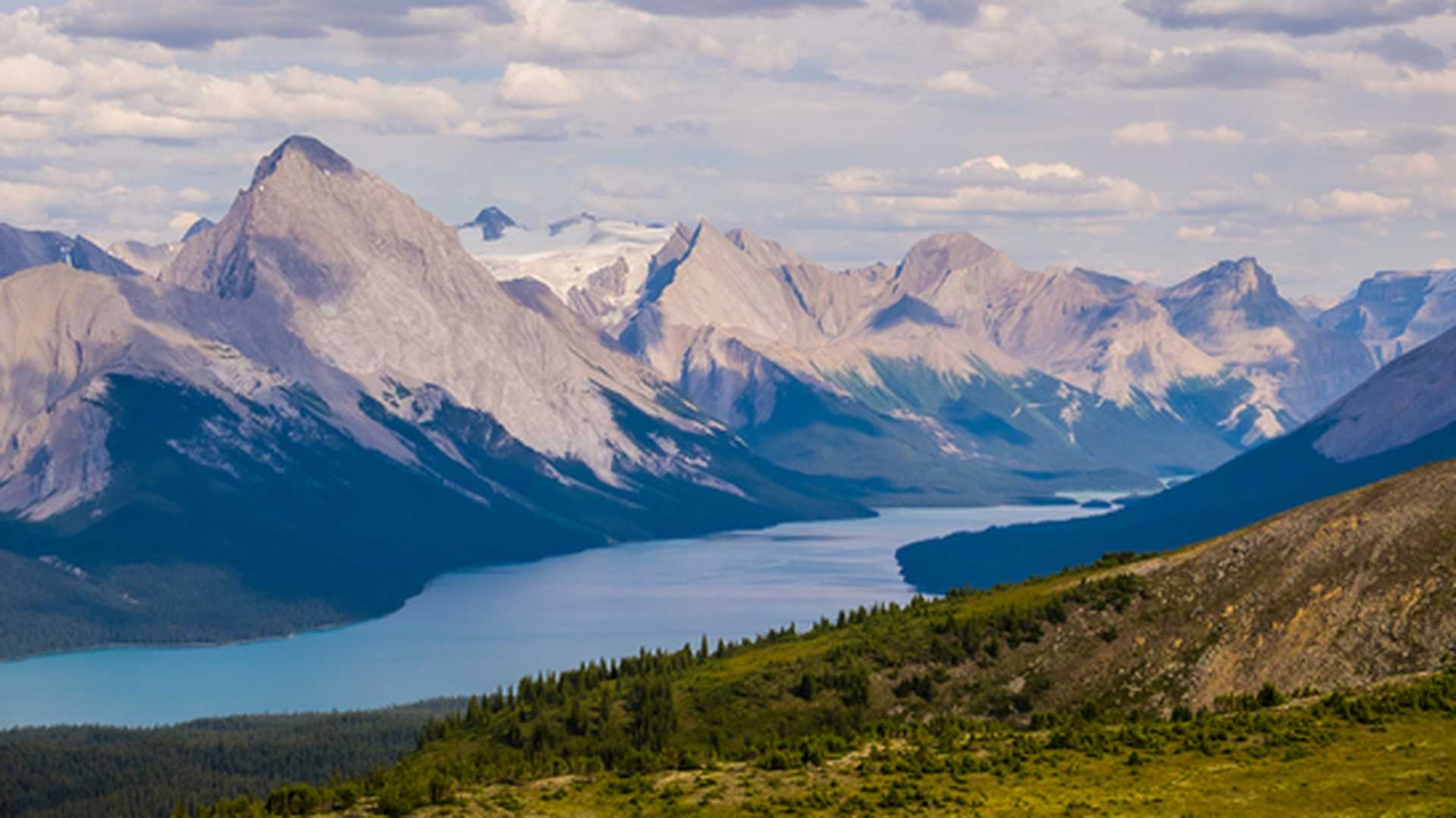 View down to Maligne Lake with mountains behind - a highlight of Jasper National Park, part of the Canadian Rockies
