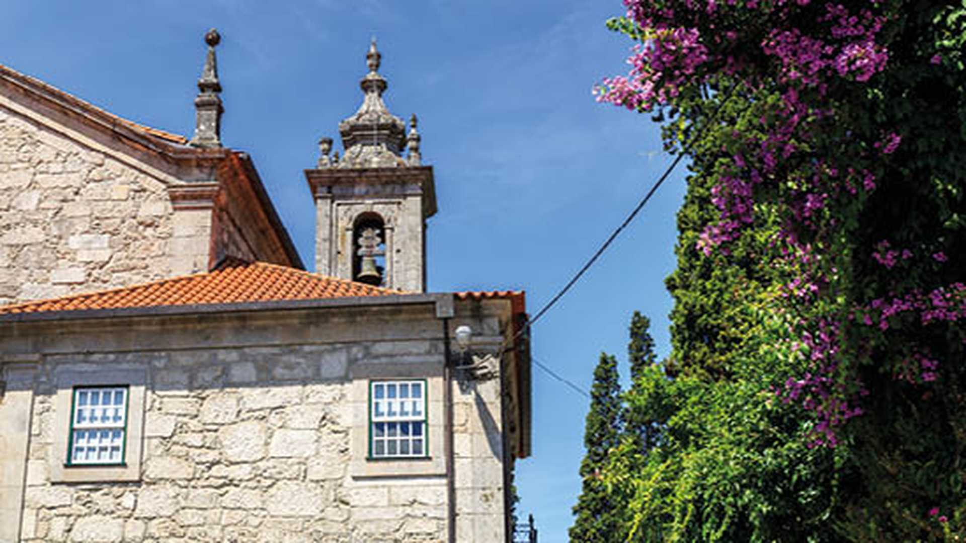 Bell tower of St Peter Church in Castro Daire, Portugal