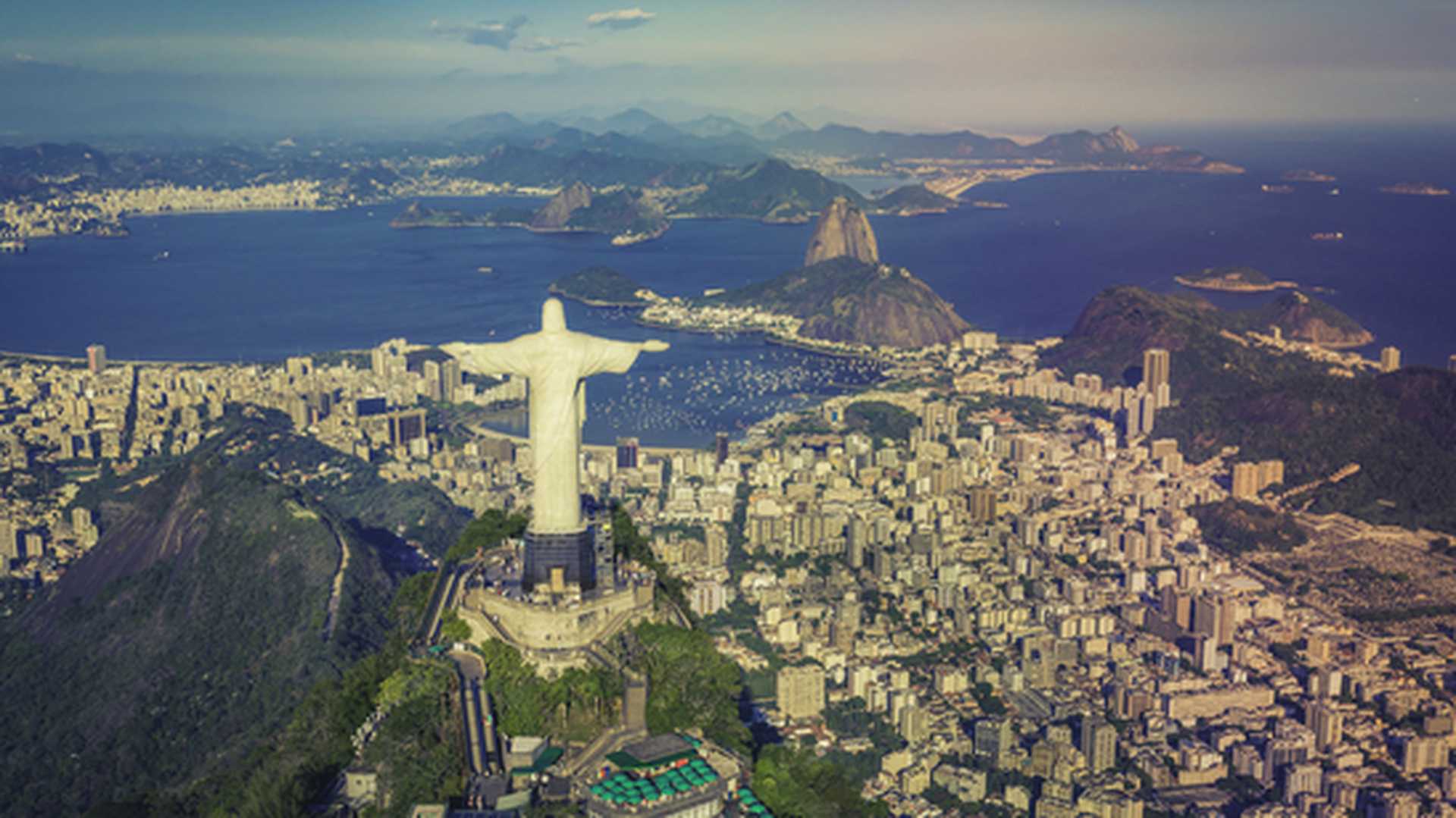 Aerial view of Christ the Redeemer and Botafogo Bay from above, Rio e Janeiro, Brazil