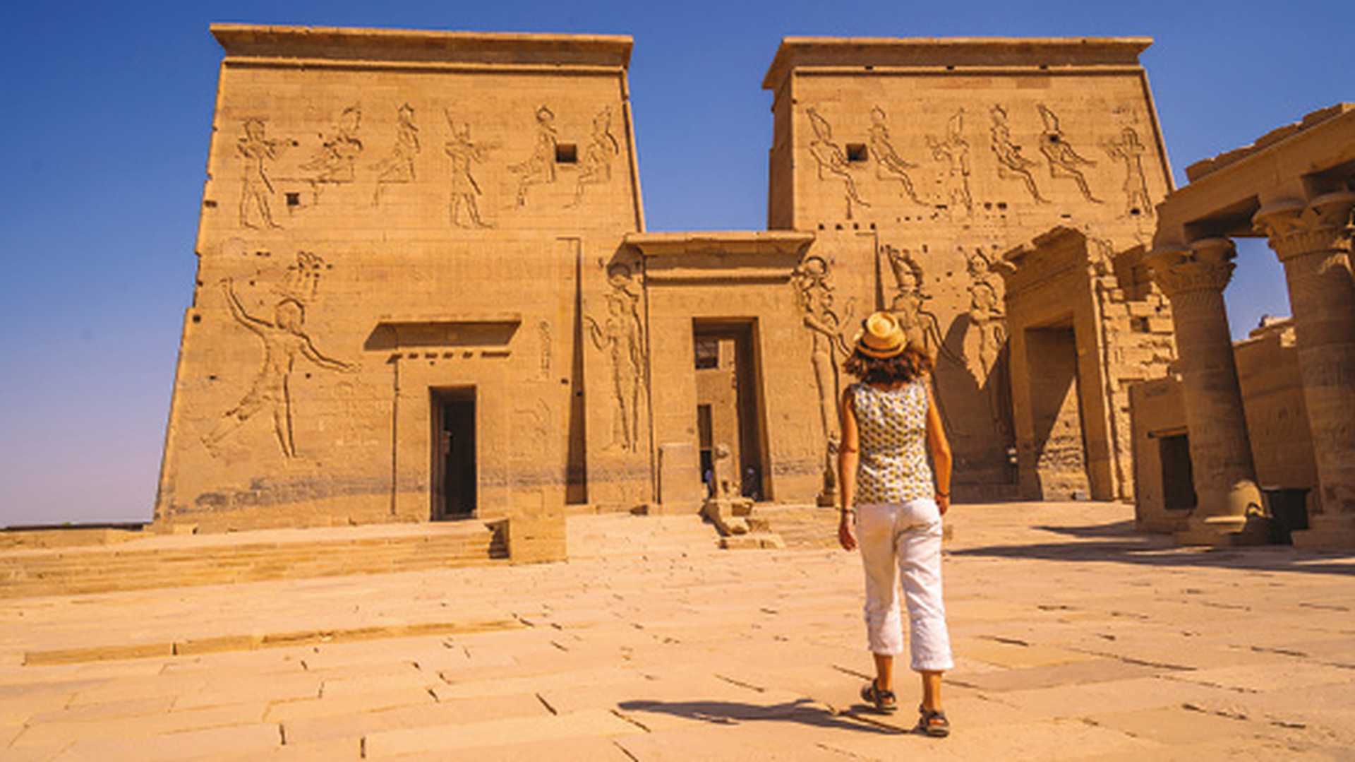 Tourist at temple of Philae, Egypt