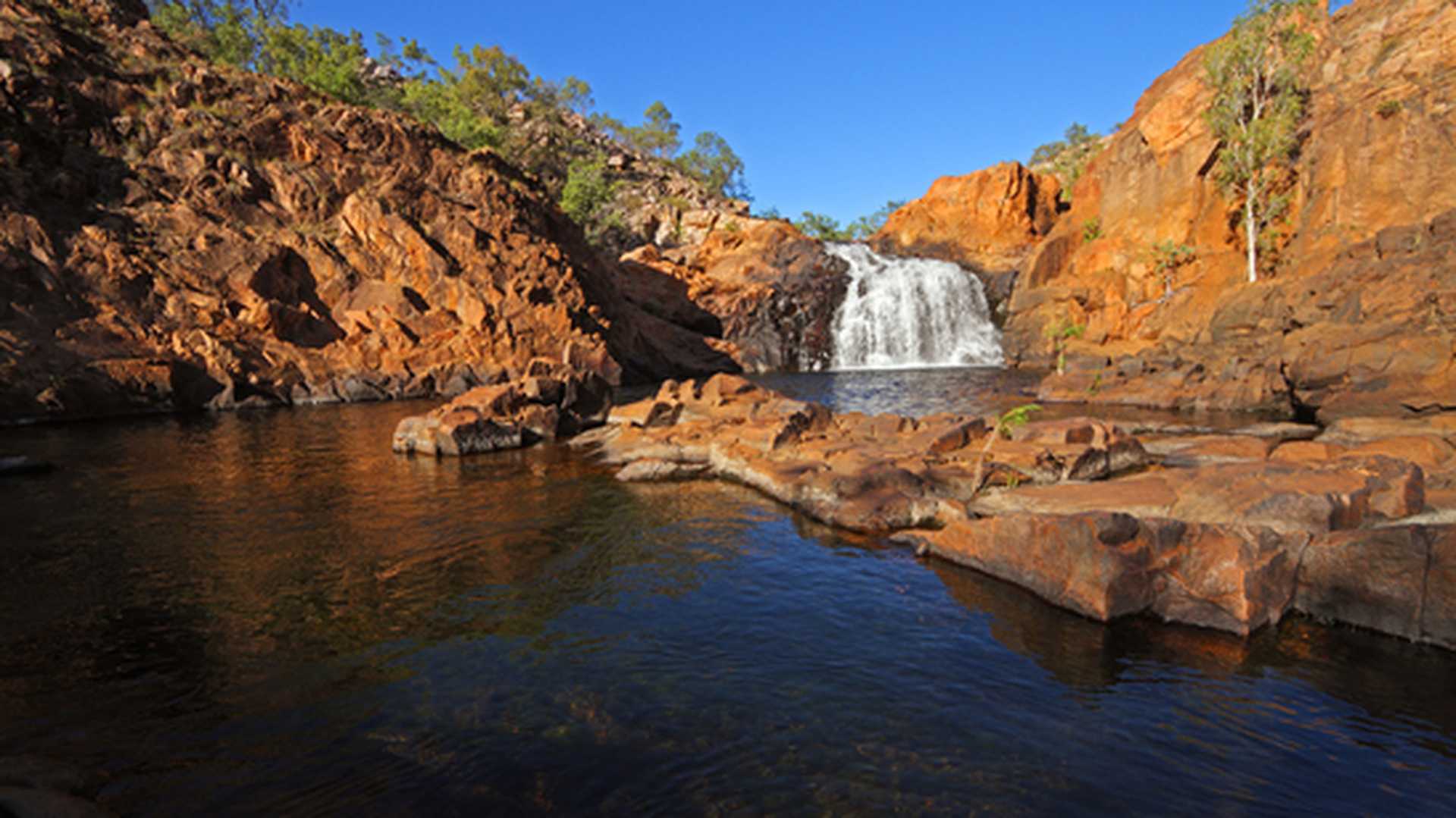 Small waterfall and pool with clear water, Kakadu National Park, Australia