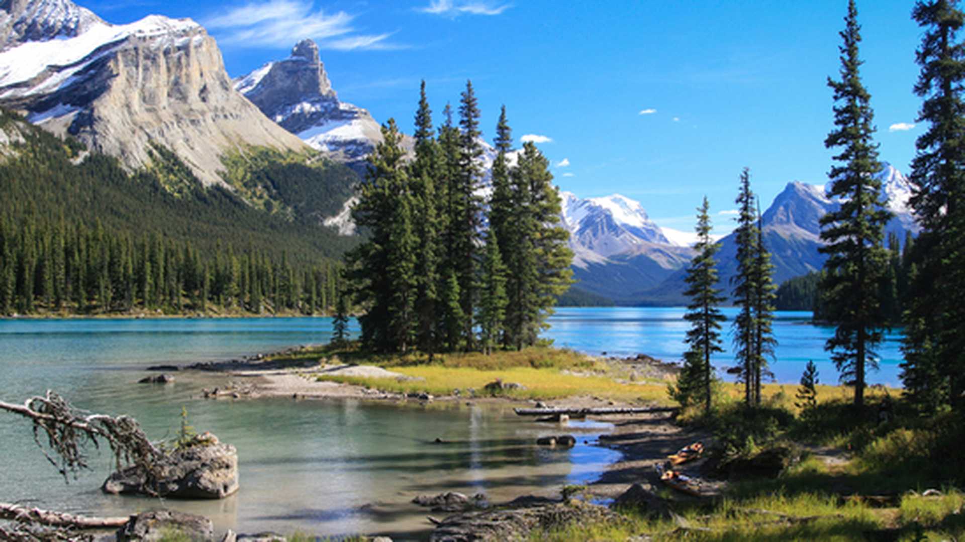 Spirit Island on Maligne Lake in Jasper National Park, with soaring mountains behind