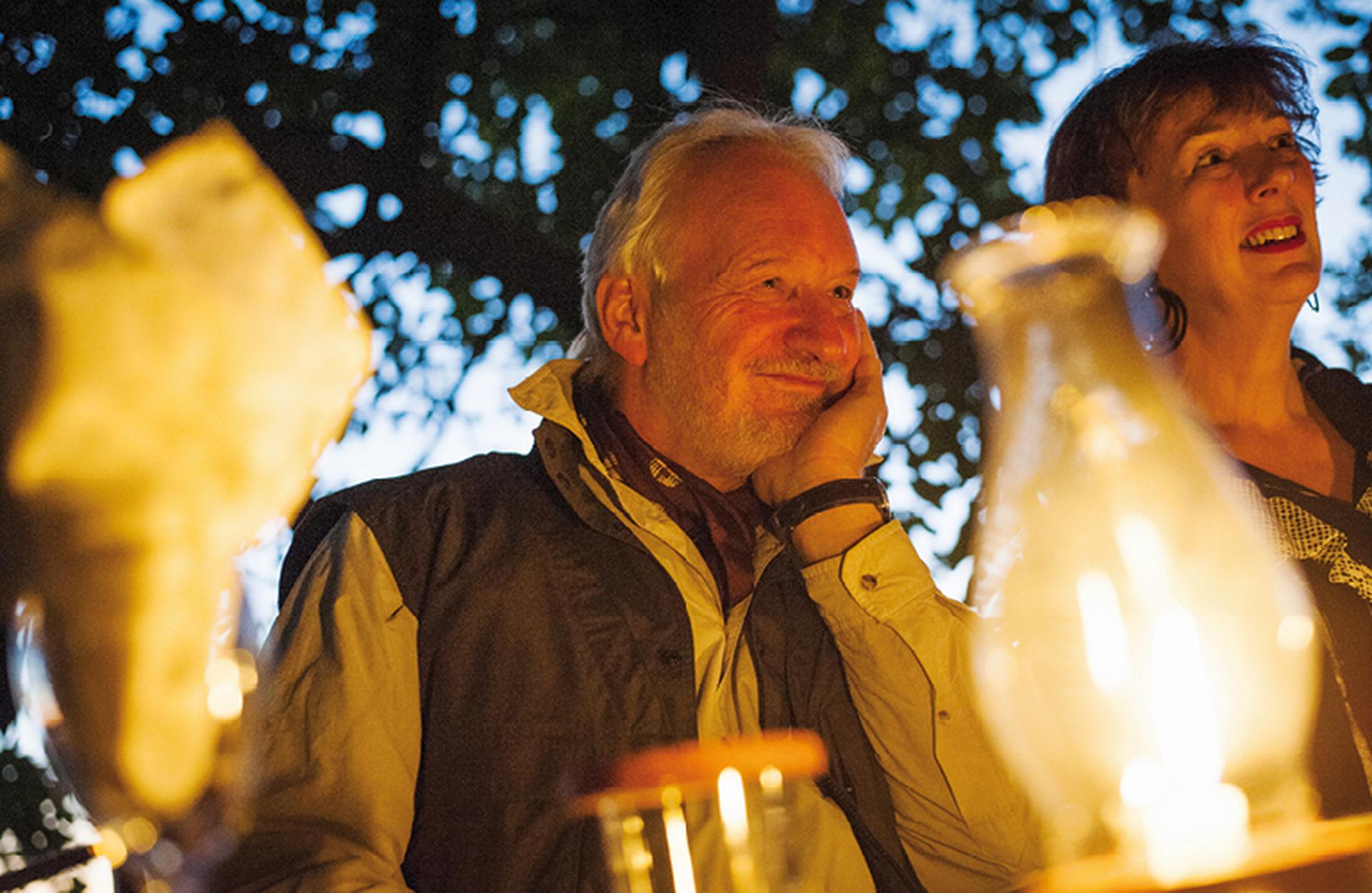 Man at table outside