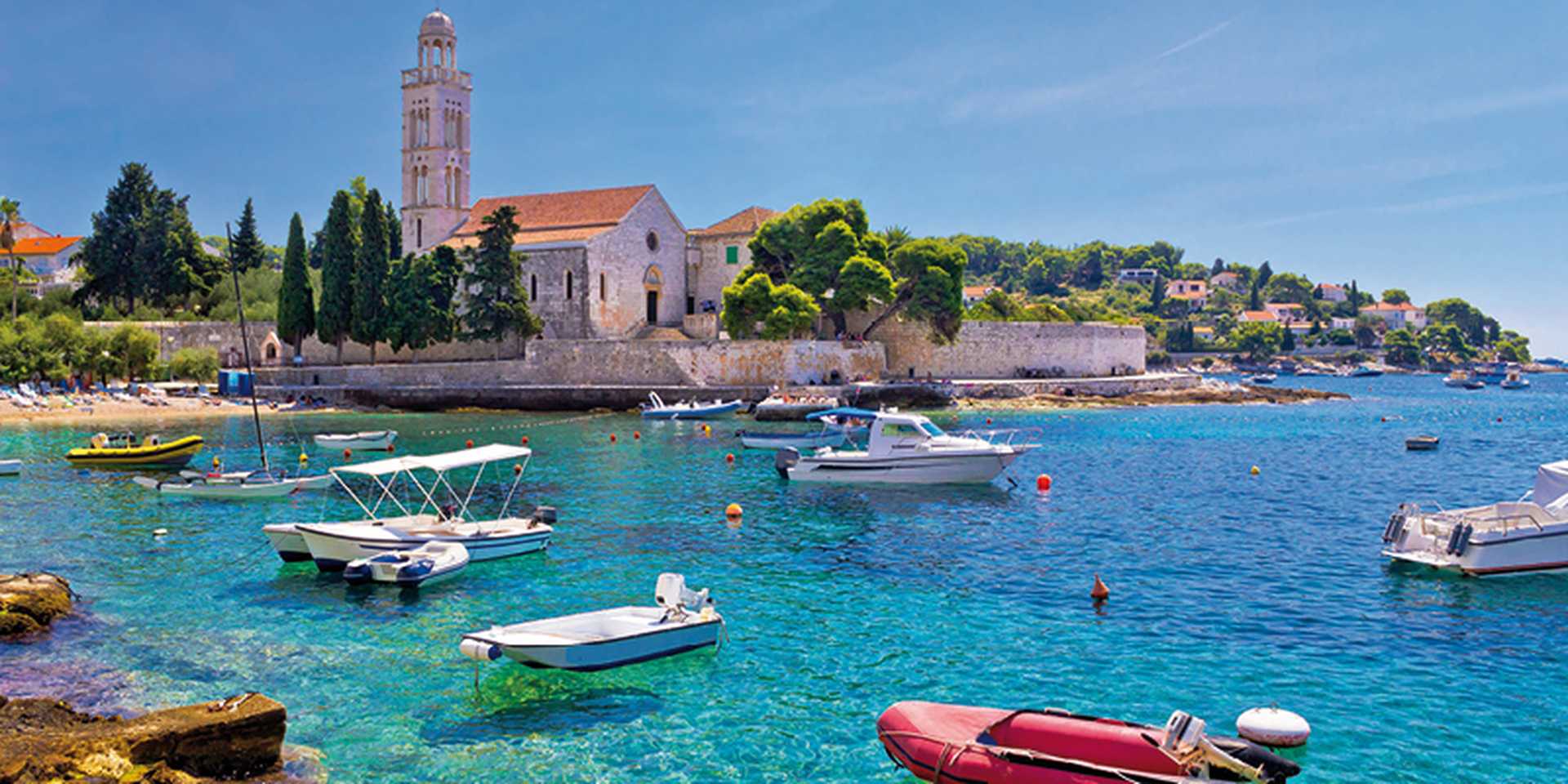 Turquoise sea of Hvar island, franciscian monastery view in Dalmatia, Croatia