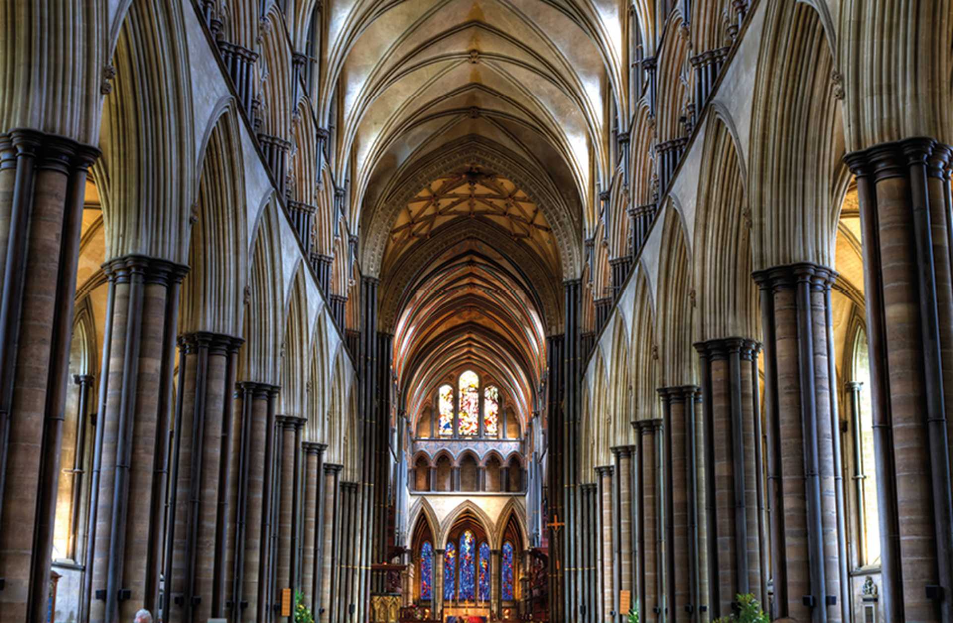 Interior of Salisbury Cathedral, looking down to the famous stained-glass window