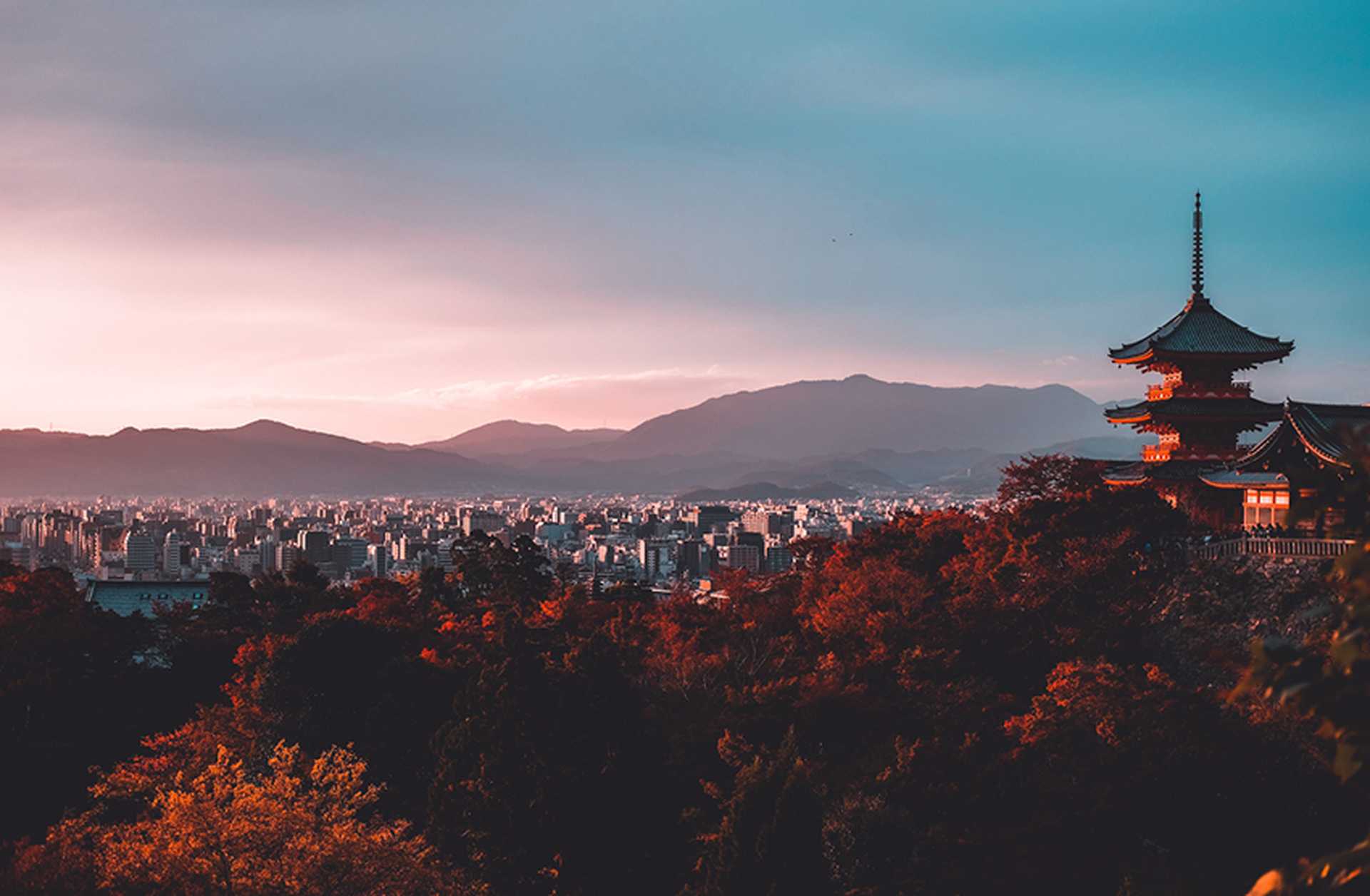 Kiyomizu-dera temple in Kyoto, with autumnal trees beneath