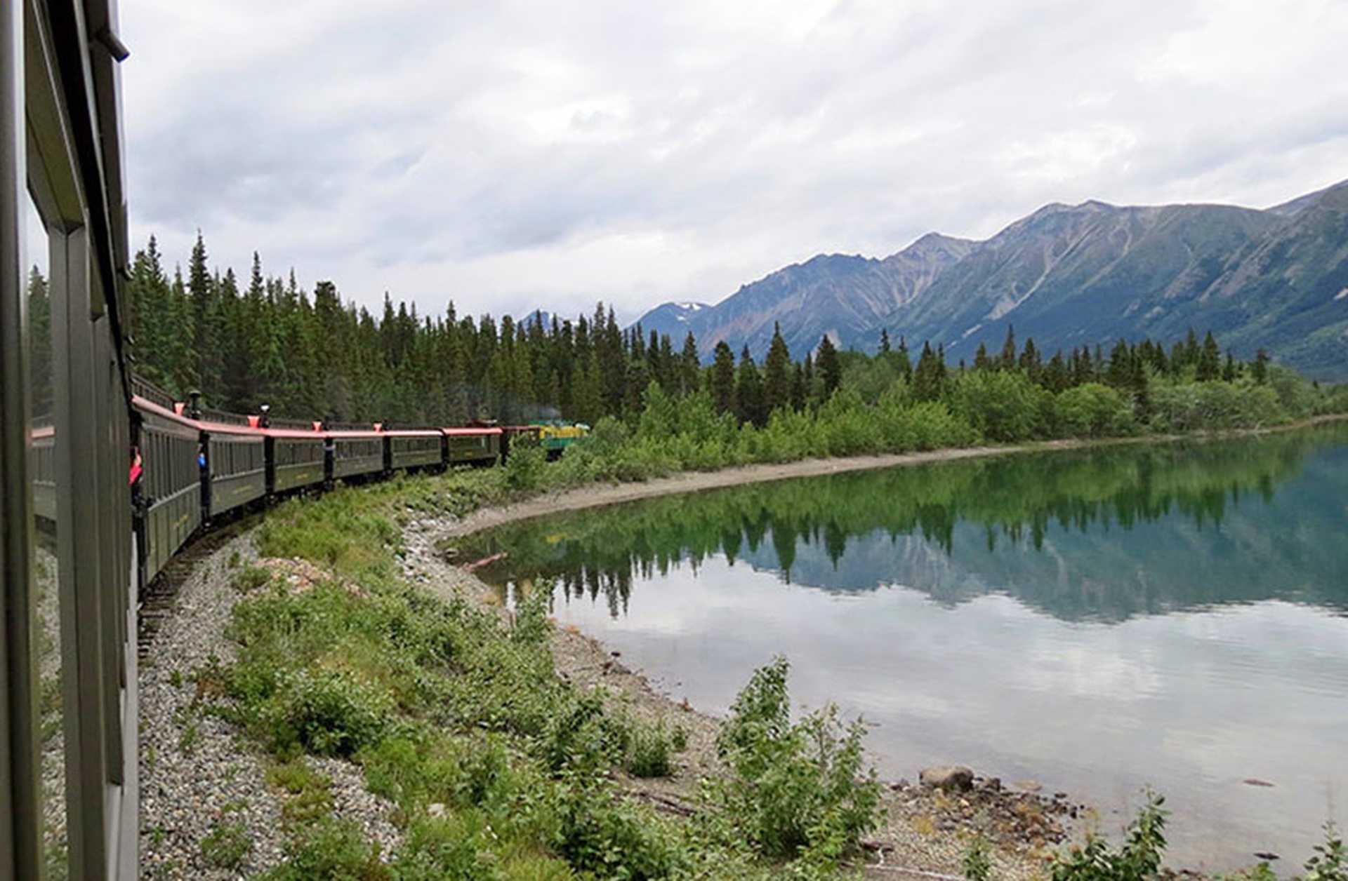 The White Pass & Yukon Route train travels through rugged Alaskan landscapes