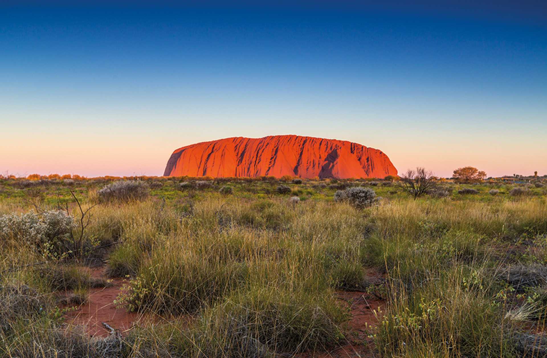 Uluru at sunset, part of the Uluru-Kata Tjuta National Park in Australia's Northern Territory