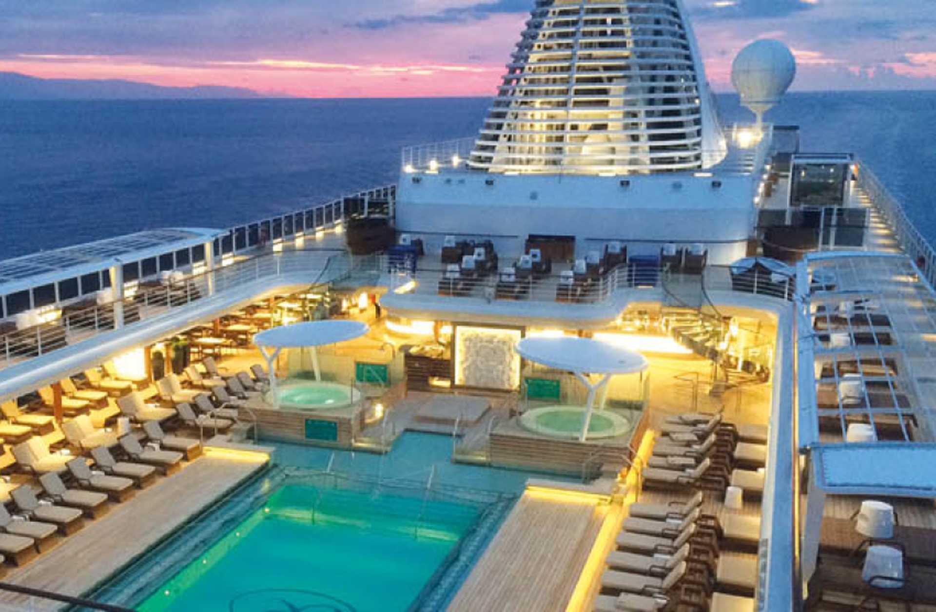 Pool deck of a cruise ship at dusk