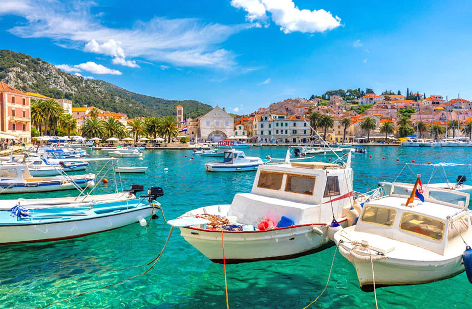 Small boats are moored in a harbour on the island of Hvar, Croatia