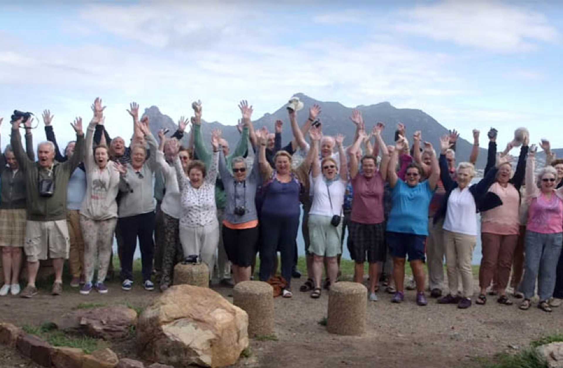 A Titan tour group celebrates their trip of a lifetime to Peru
