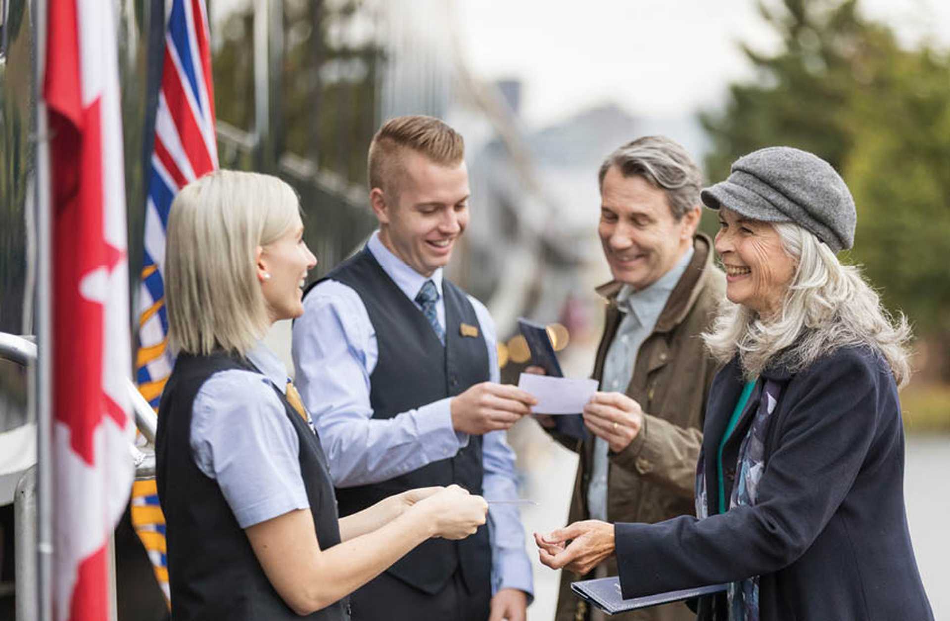Passengers are welcomed on board Rocky Mountaineer in Canada