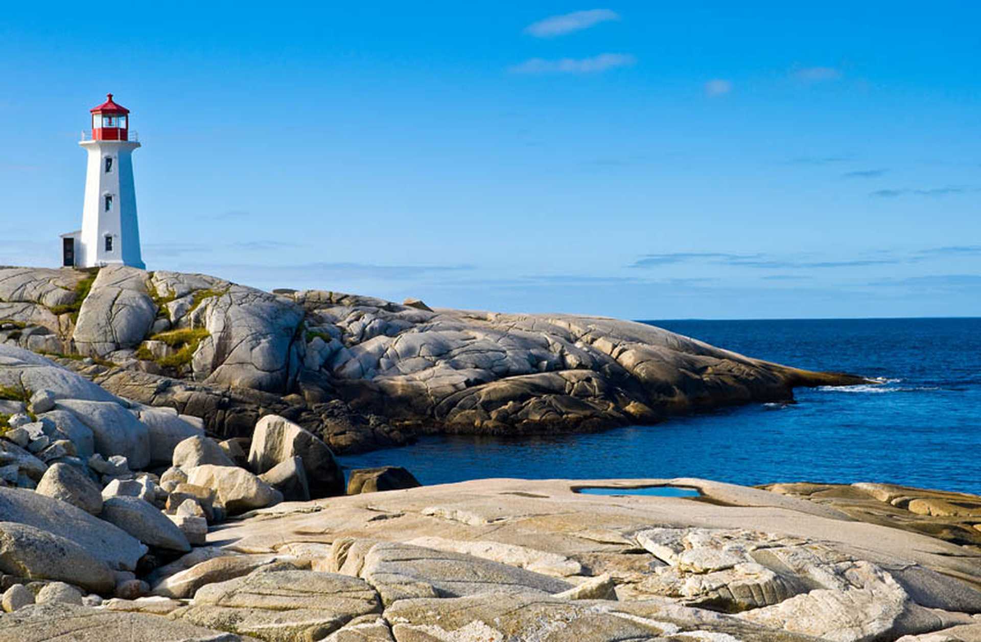 Peggy's Cove Lighthouse sits on the rocks in Nova Scotia, Canada