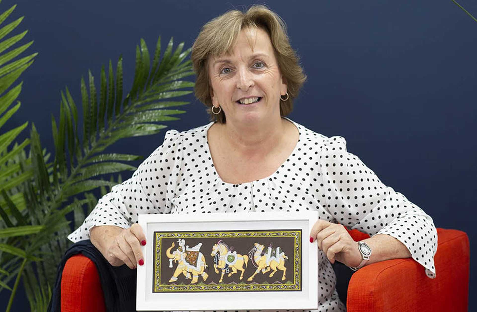 Titan travel advisor Michaela poses with a souvenir from her solo trip to India