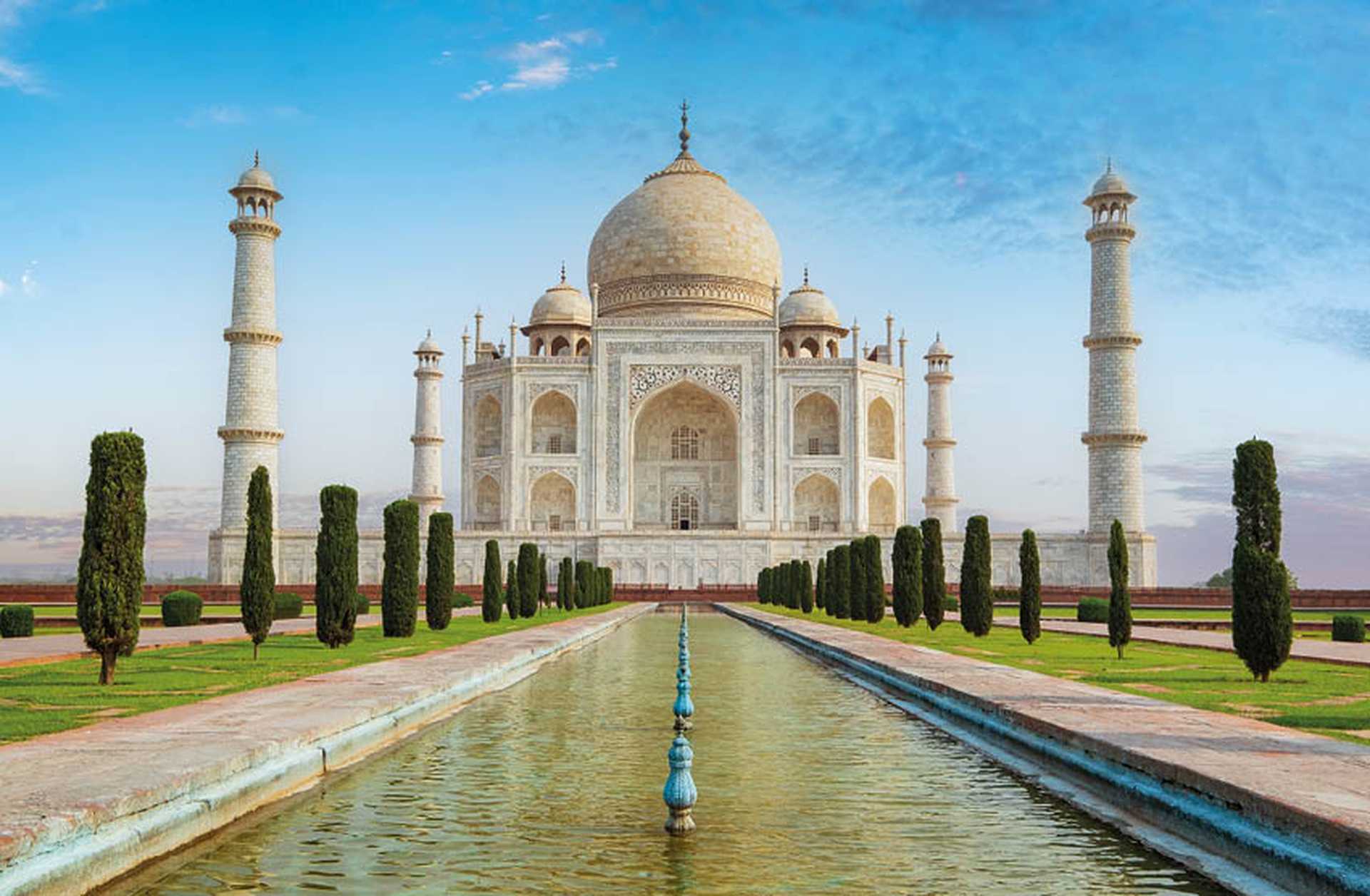 Taj Mahal front view reflected in pool, India