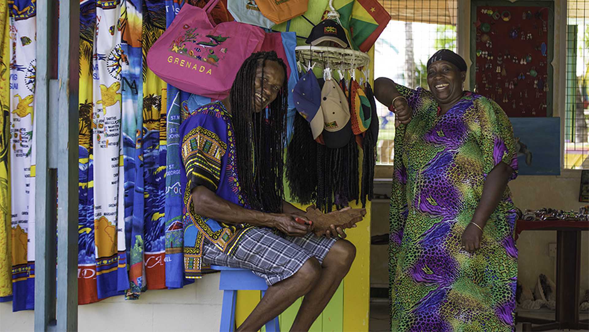 Locals by a shop in Grenada