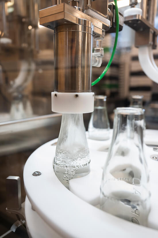 Built for high-volume environments, our automated systems integrate discreetly into your operations and produce up to 2,000 bottles per hour