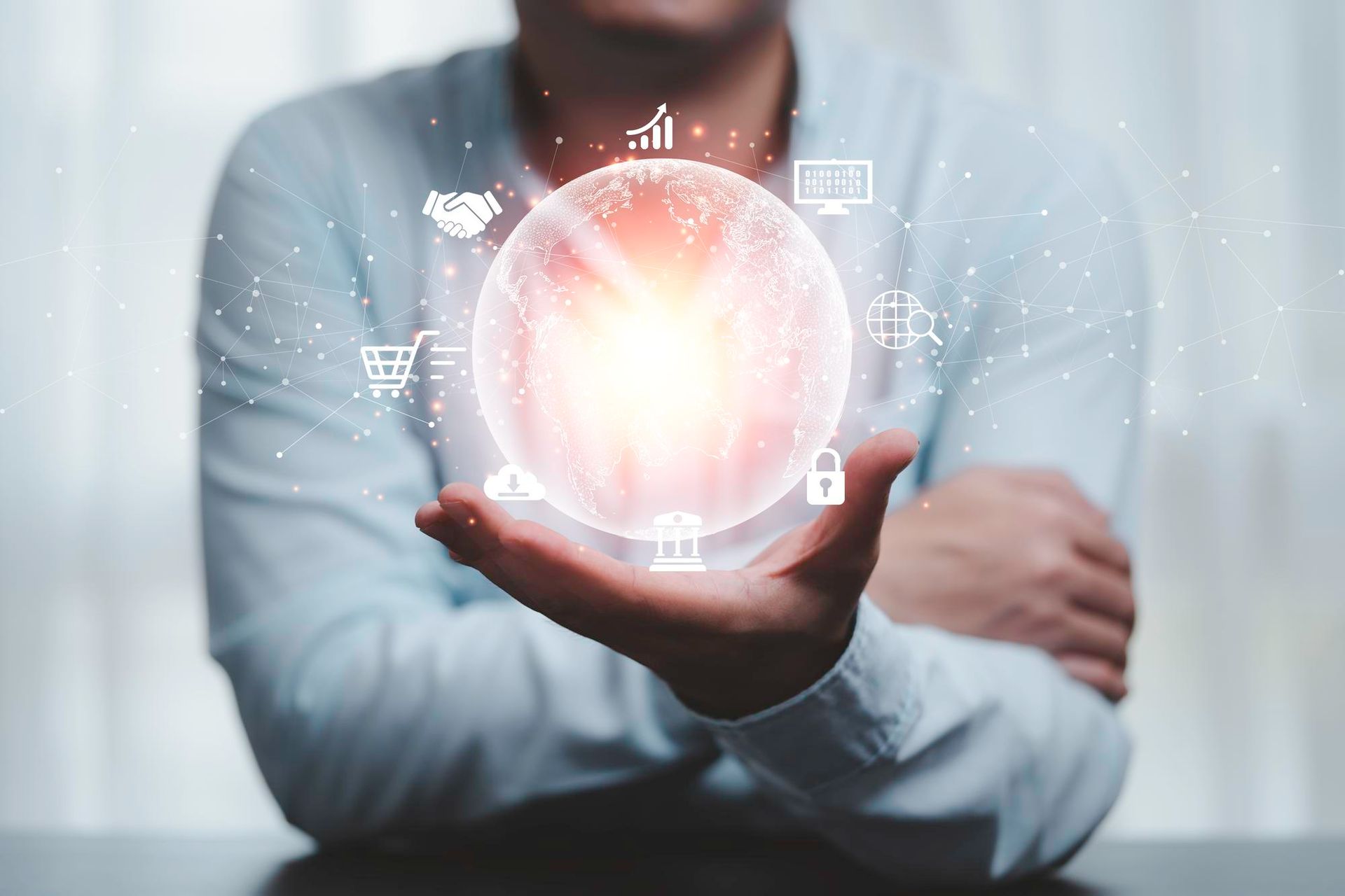 Photograph of a person holding a illustrational globe solution of Systemair