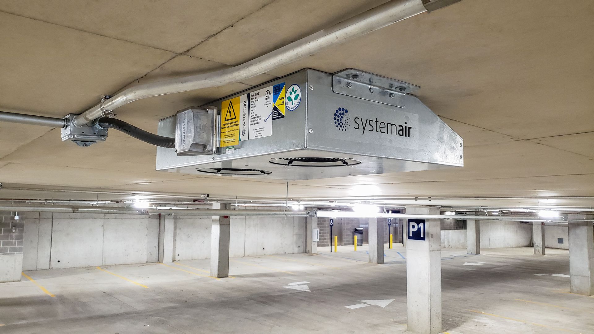 Close up of the IV Smart EC Jet Fan in a parking garage