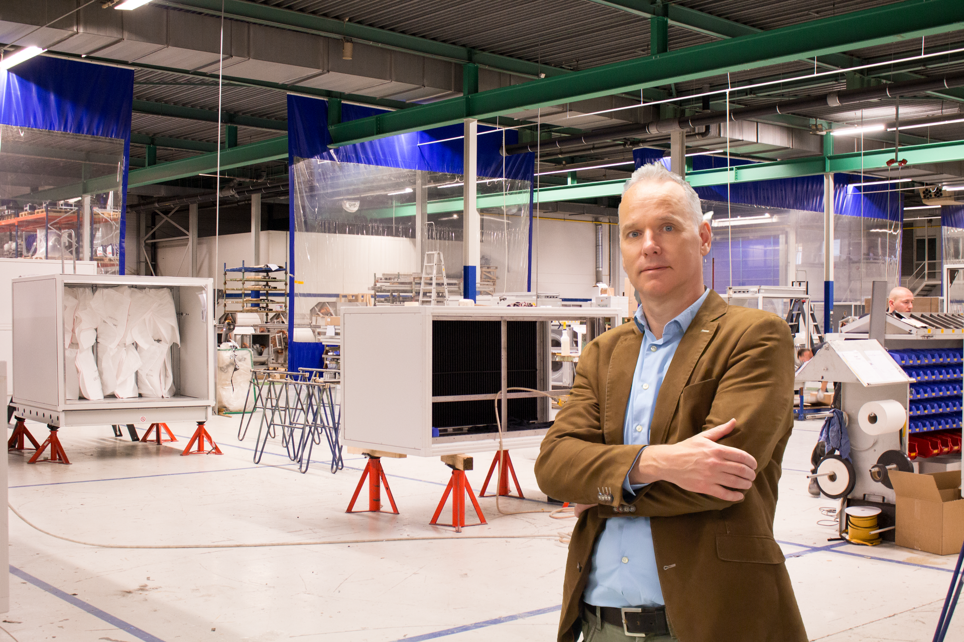 man in standing in factory