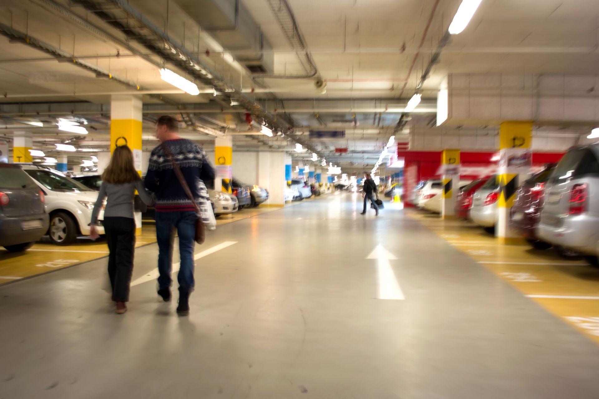 Image of people in parking garage