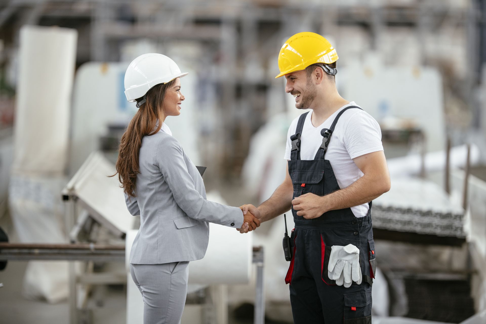 Architect and worker working on project. Colleagues handshaking in factory.
factory, industry, colleague, business, handshaking, deal, talking, analyzing, project, discussing, together, architect, warehouse, making, working, young, construction, building, site, adult, man, worker, engineer, businesswoman, teamwork, hard hat, plan, copy space, suit, helmet, caucasian, attractive, manager, engineering, male, work, discussion, female, meeting, occupation, men at work, professional, people, reconstruction, trust, team, cooperation, developer, expertise, happy