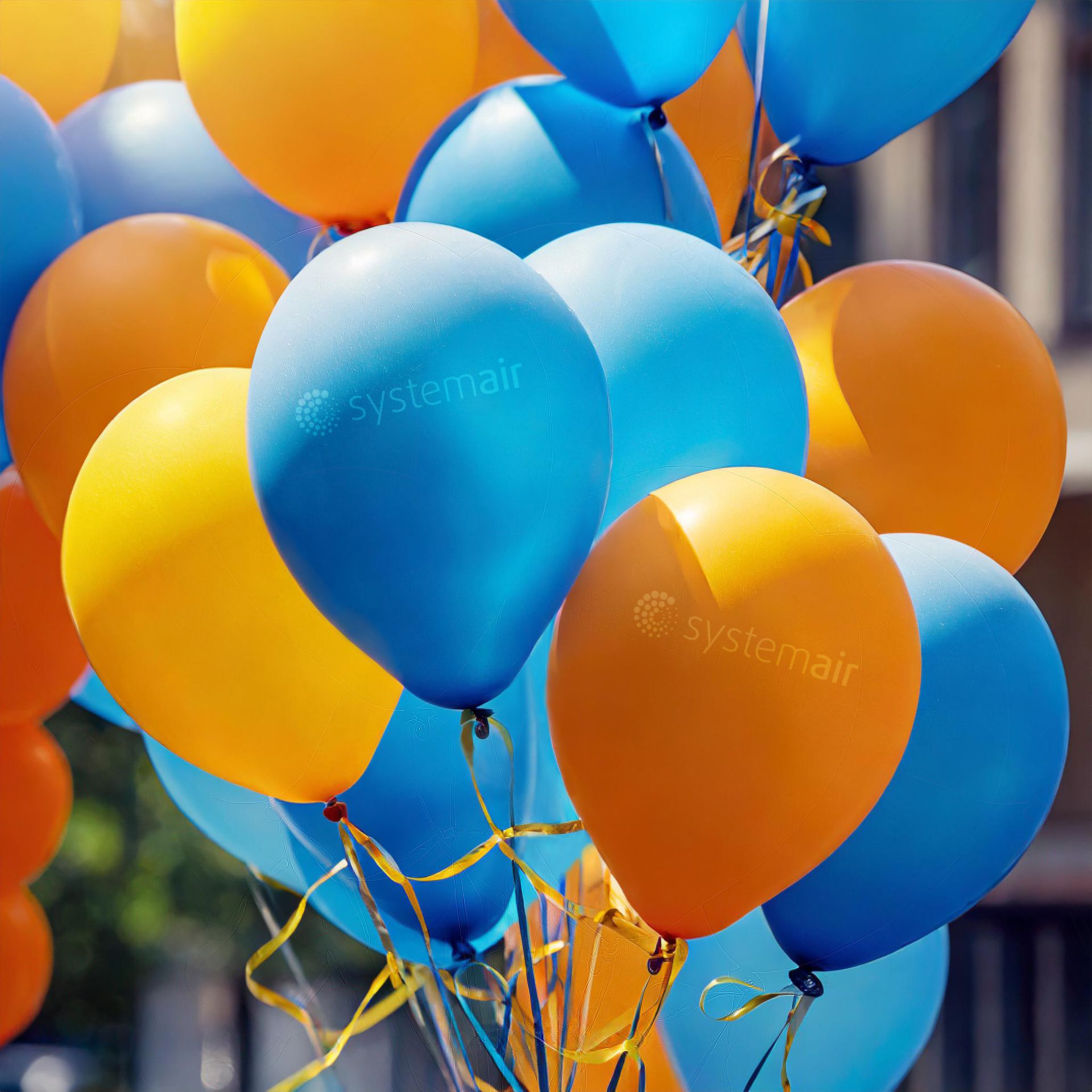 Photograph of balloons with Systemair logo