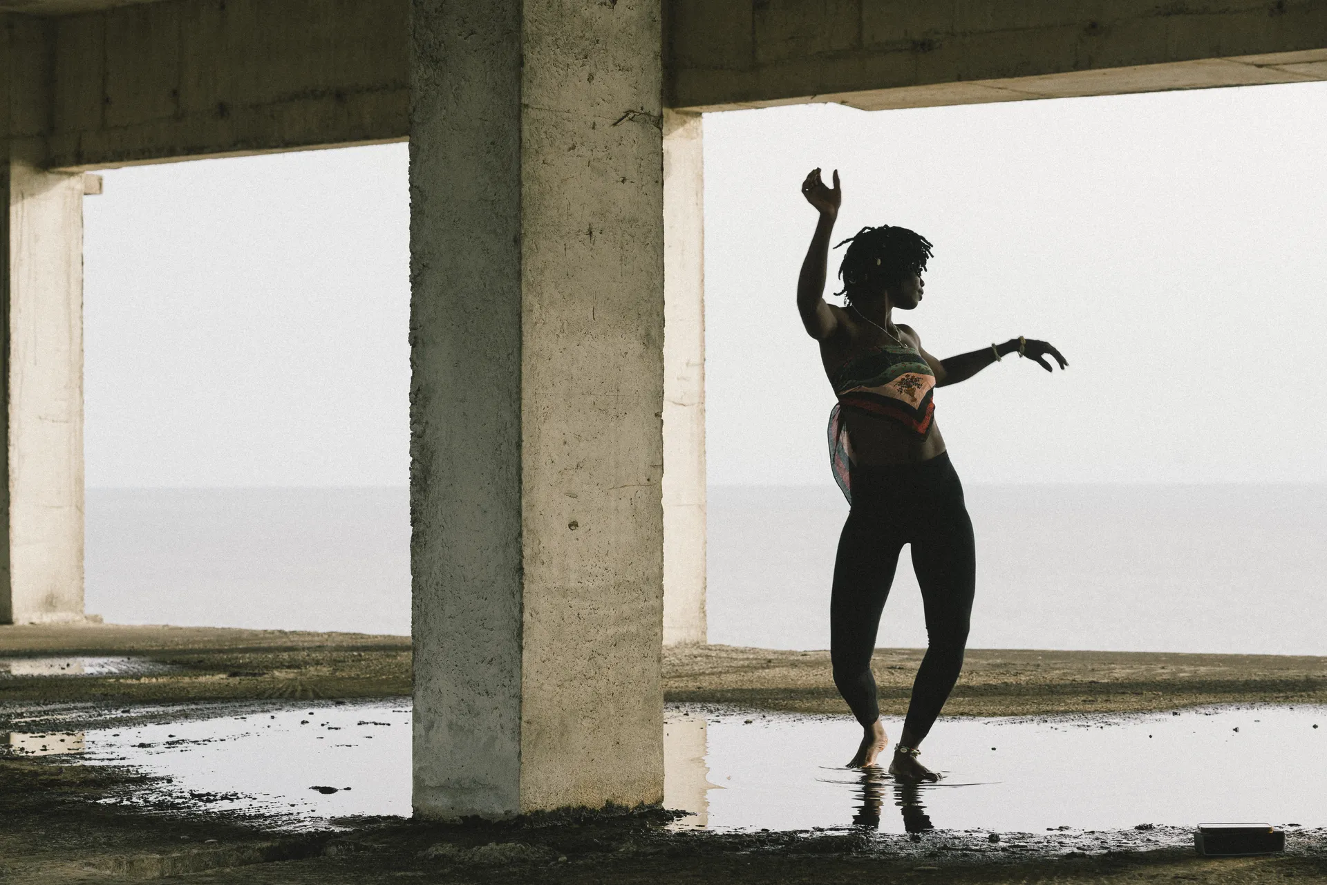 Dancer performing in abandoned building in Freetown