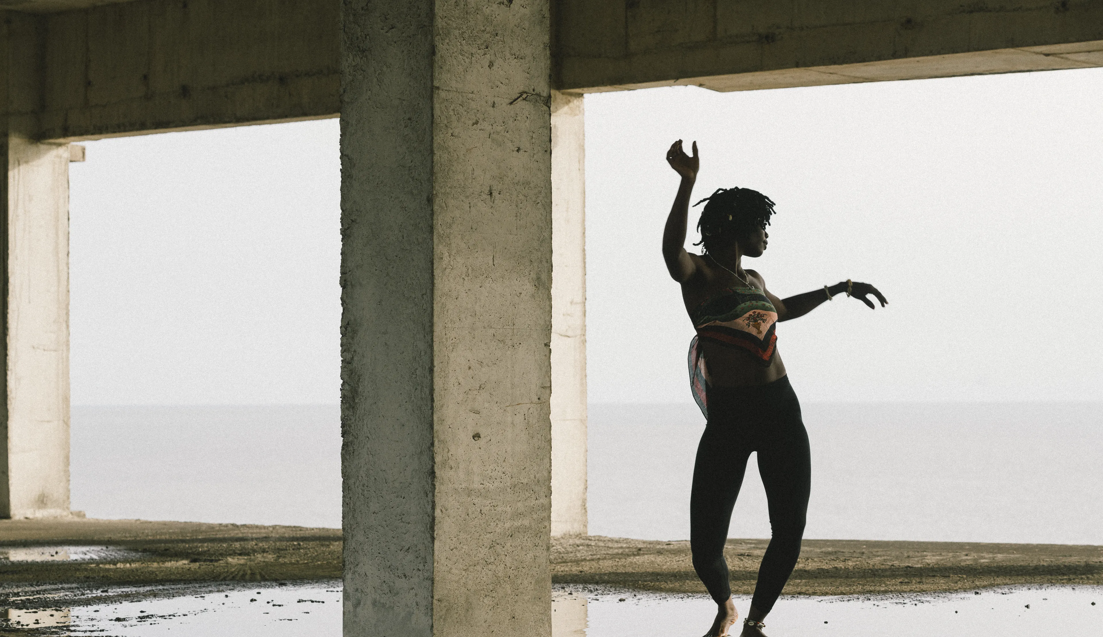 Dancer performing in abandoned building in Freetown