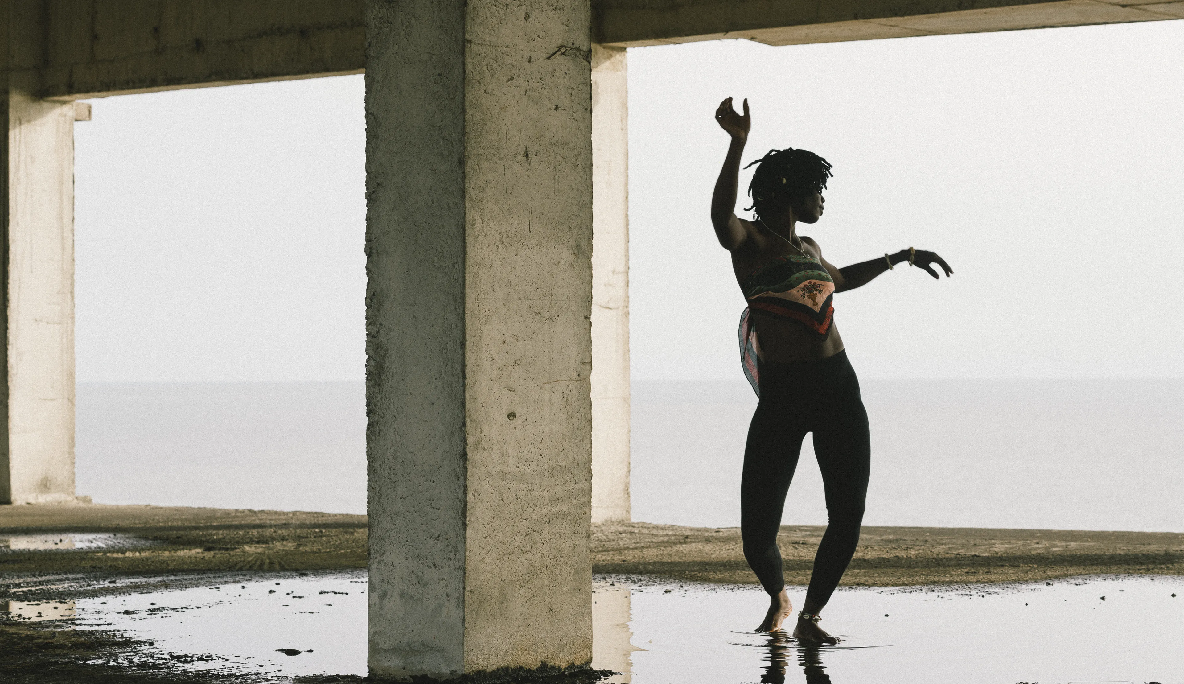 Dancer performing in abandoned building in Freetown