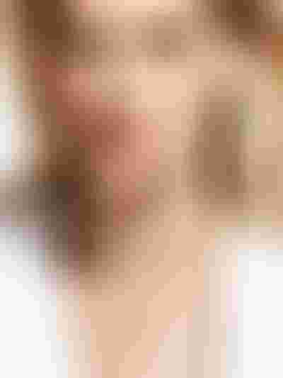 gold necklace with a puffy heart