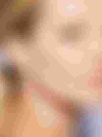 gold ear stacks. earrings with sparkling stones