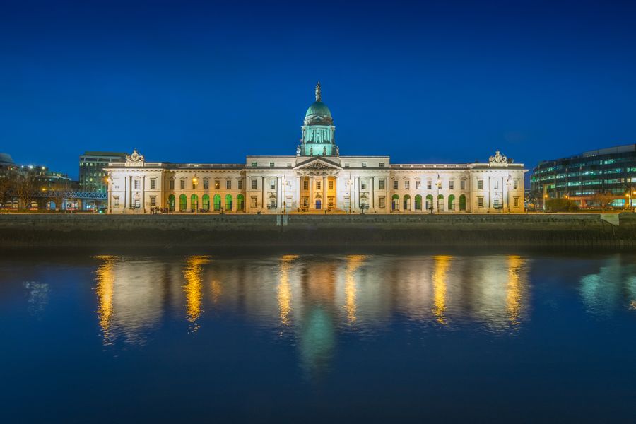 Custom House and river Liffey in Dublin at dusk